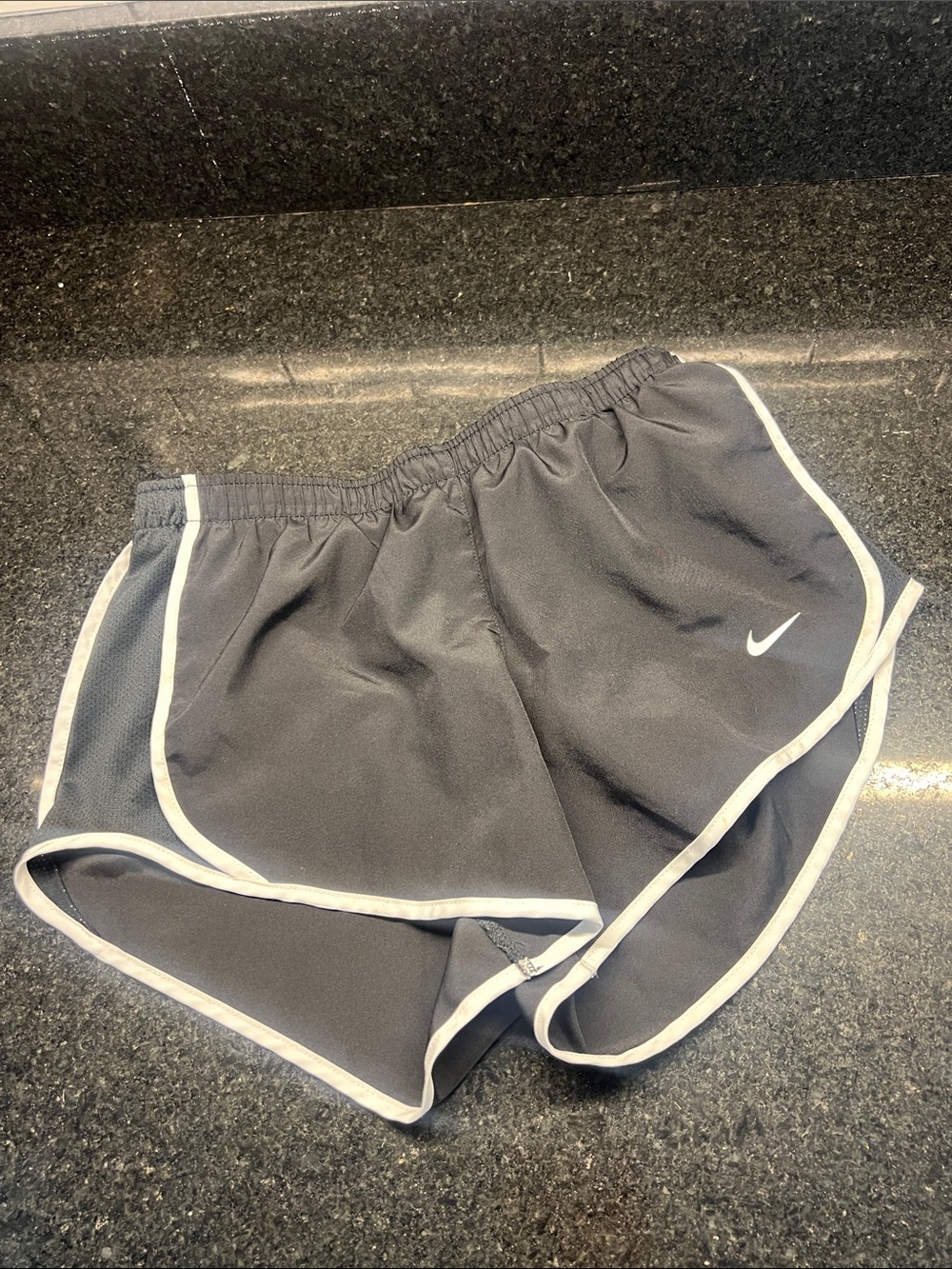 Nike Black Shorts with White Trim and Swoosh